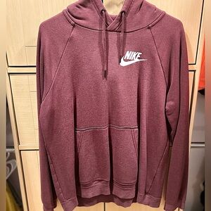 A medium red Nike hoodie